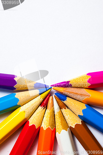 Image of colored pencils on white background