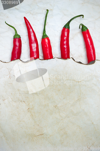 Image of fiery red chili peppers