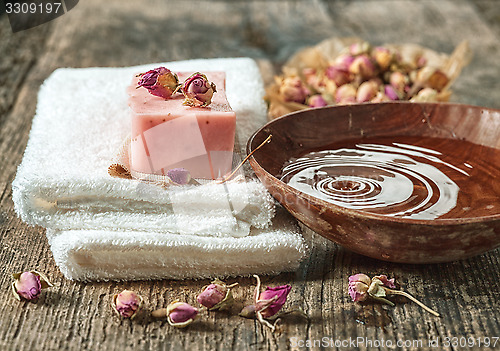 Image of still life with spa towels and natural soap