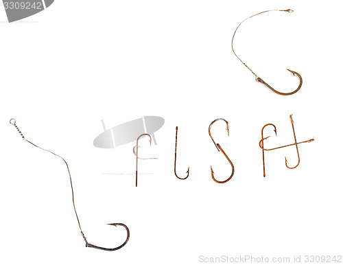 Image of Word F I S H composed of old rusty fish hooks