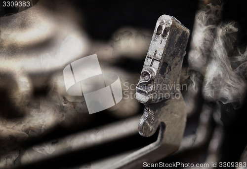 Image of 2 hammer - old manual typewriter - mystery smoke