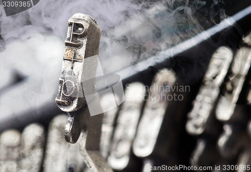 Image of P hammer - old manual typewriter - mystery smoke