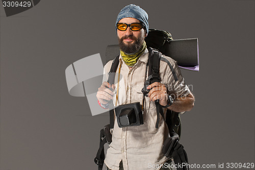 Image of Portrait of a male fully equipped tourist 