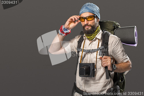 Image of Portrait of a male fully equipped tourist 