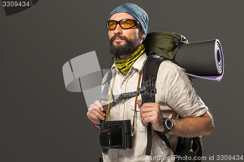 Image of Portrait of a male fully equipped tourist 