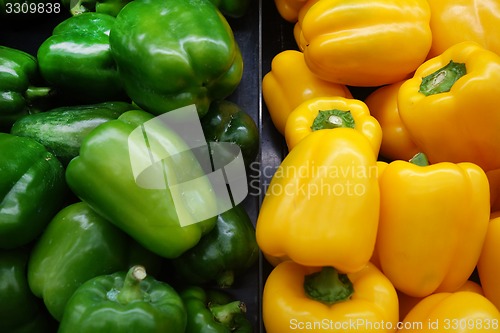 Image of Green and yellow bell peppers