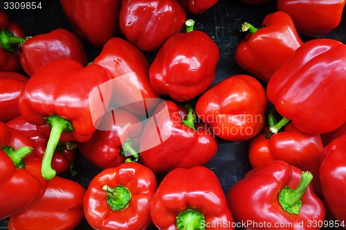 Image of Red bell peppers at a farmers market