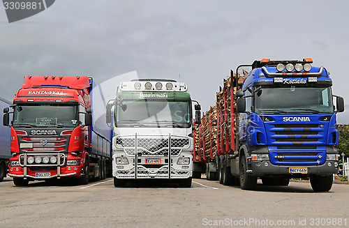 Image of Scania and Mercedes-Benz Actros Trucks Parked