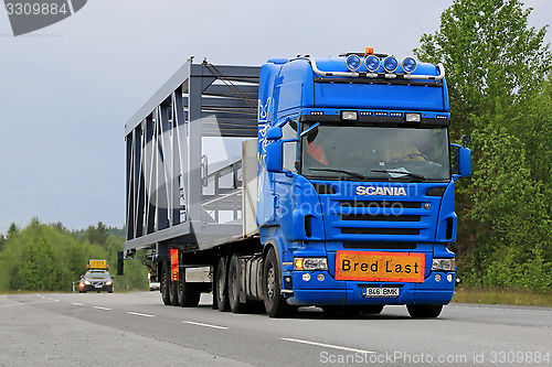 Image of Scania Semi Truck Hauls a Wide Load