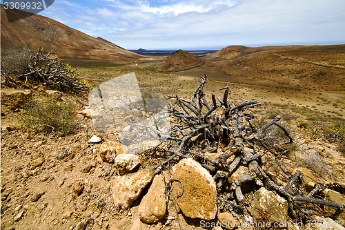 Image of vulcanic timanfaya  rock stone sky  