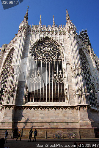 Image of spire italy church  rose   in milan and column