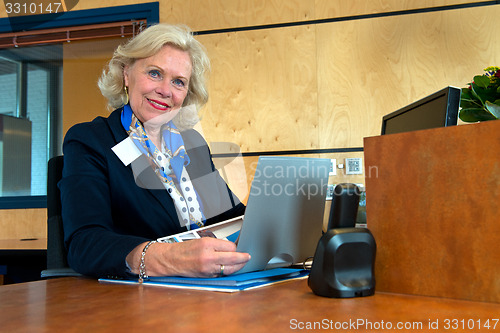 Image of senior receptionist