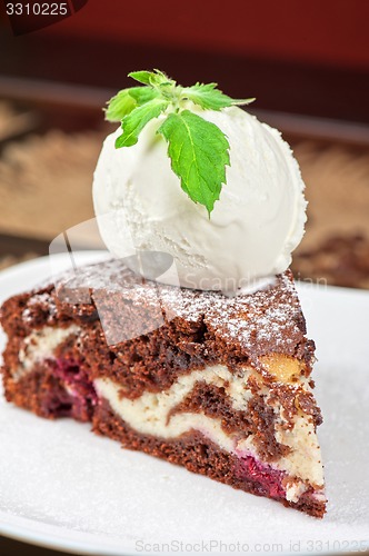 Image of chocolate cake with jam ice cream