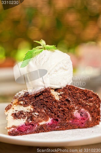 Image of chocolate cake with jam ice cream