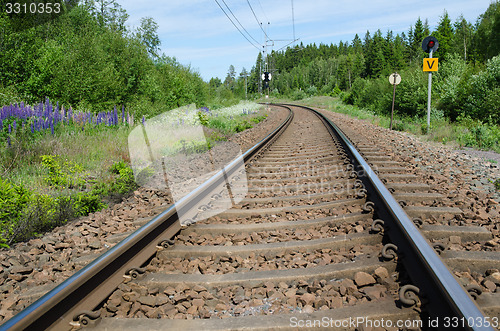 Image of Railroad tracks curve