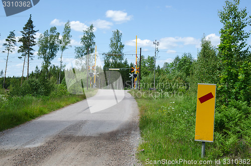 Image of Traffic sign at a railroad crossing