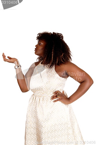 Image of African woman showing with hand.