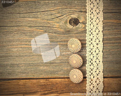 Image of Three vintage bone buttons and lace tape