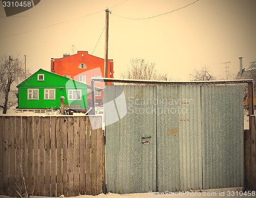 Image of red and green houses in a Rumyantsevo village, Moscow, Russia