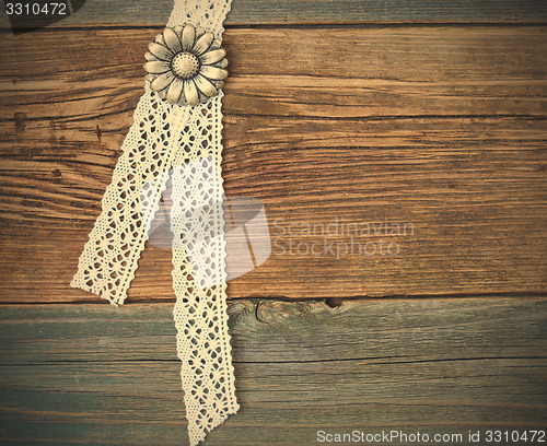 Image of vintage metal buttons flowers and lace tape