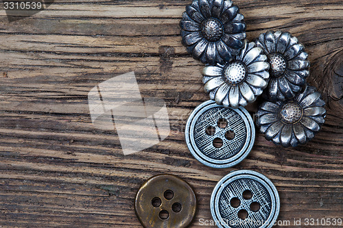 Image of several vintage metal buttons