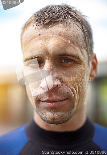 Image of Portrait of a handsome young man in  diving suit