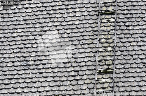 Image of roof covered with wooden shingles and stairs