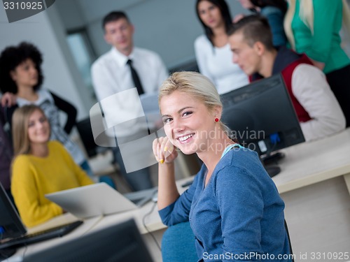 Image of students with teacher  in computer lab classrom