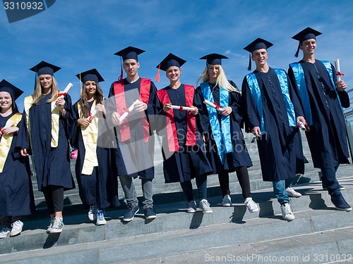 Image of young graduates students group