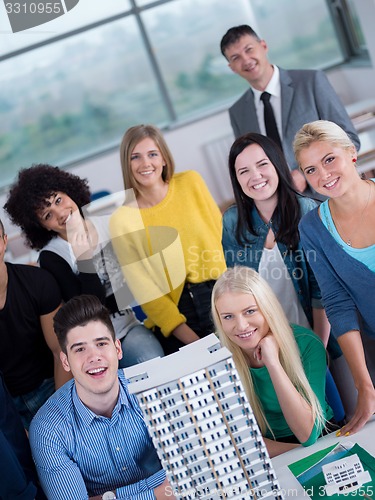 Image of students with teacher  in computer lab classrom