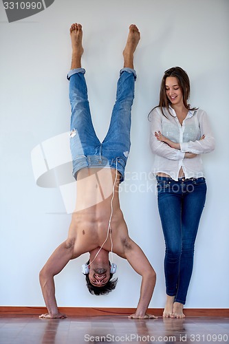 Image of happy young romantic couple have fun arelax  relax at home