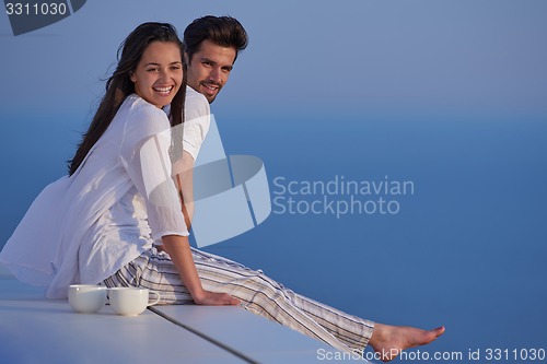 Image of happy young romantic couple have fun arelax  relax at home