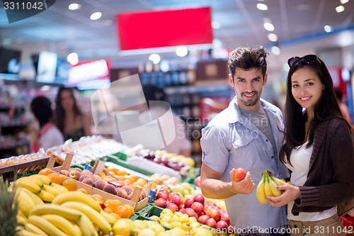 Image of couple shopping in a supermarket