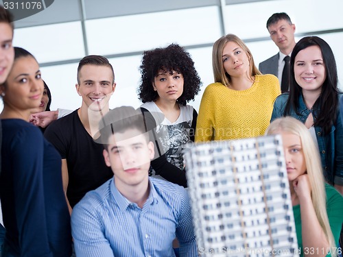 Image of students with teacher  in computer lab classrom