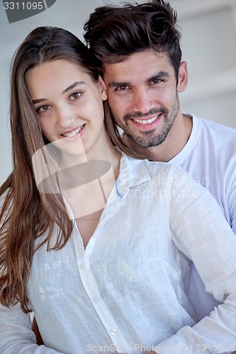 Image of happy young romantic couple have fun arelax  relax at home