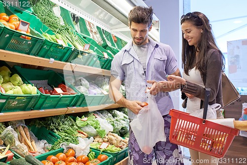 Image of couple shopping in a supermarket