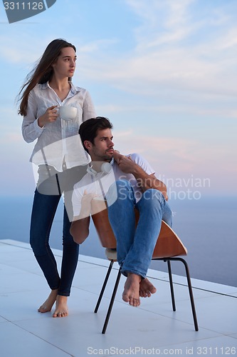 Image of happy young romantic couple have fun arelax  relax at home