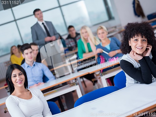 Image of students with teacher  in computer lab classrom