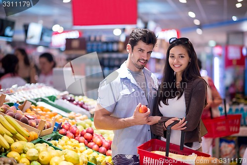 Image of couple shopping in a supermarket