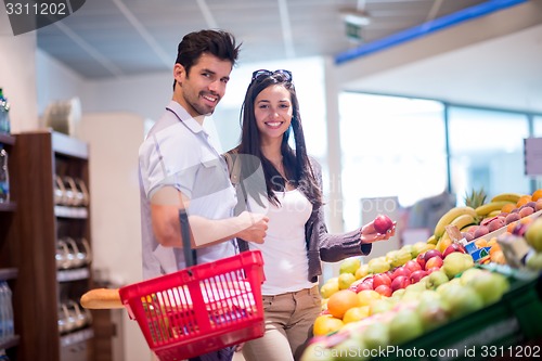 Image of couple shopping in a supermarket