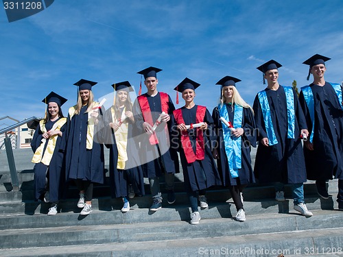 Image of young graduates students group