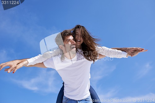 Image of happy young romantic couple have fun arelax  relax at home