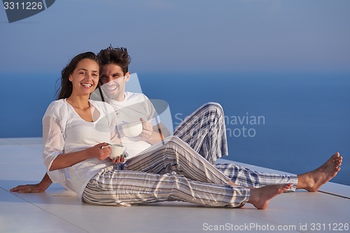 Image of happy young romantic couple have fun arelax  relax at home