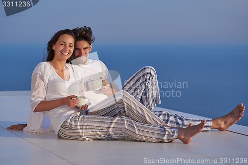 Image of happy young romantic couple have fun arelax  relax at home