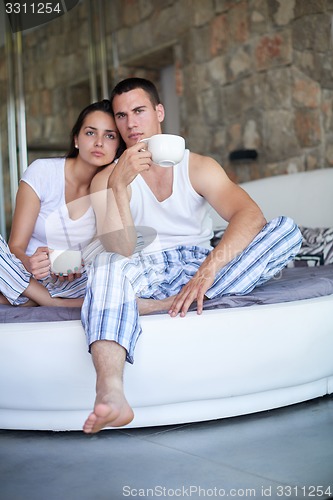 Image of couple relax and have fun in bed