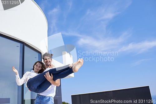 Image of happy young romantic couple have fun arelax  relax at home