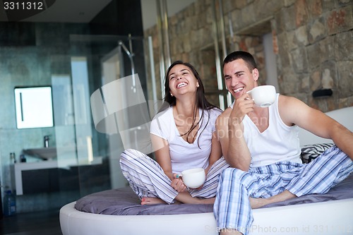 Image of couple relax and have fun in bed