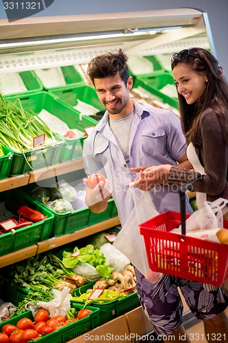 Image of couple shopping in a supermarket