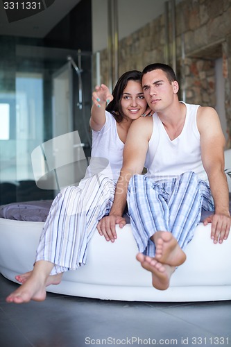 Image of couple relax and have fun in bed