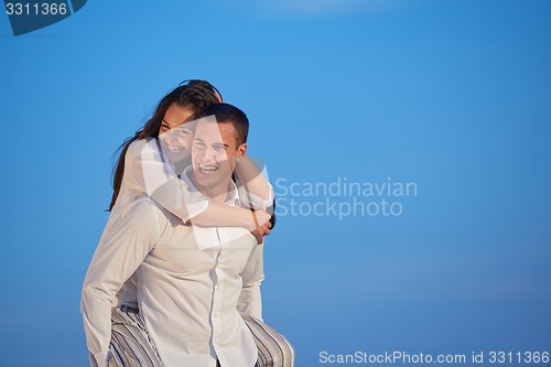 Image of happy young romantic couple have fun arelax  relax at home